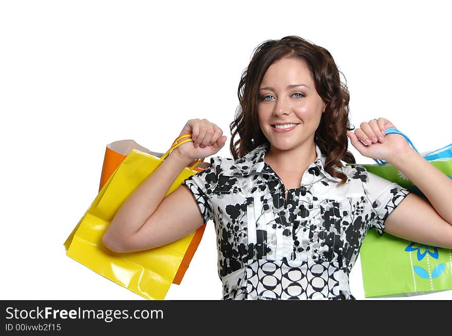 Beautiful girl with shopping bags on white background. Beautiful girl with shopping bags on white background