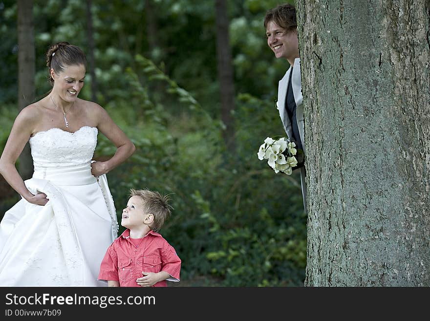 Pictures shooten on a wedding day from a beauty couple and child. Pictures shooten on a wedding day from a beauty couple and child