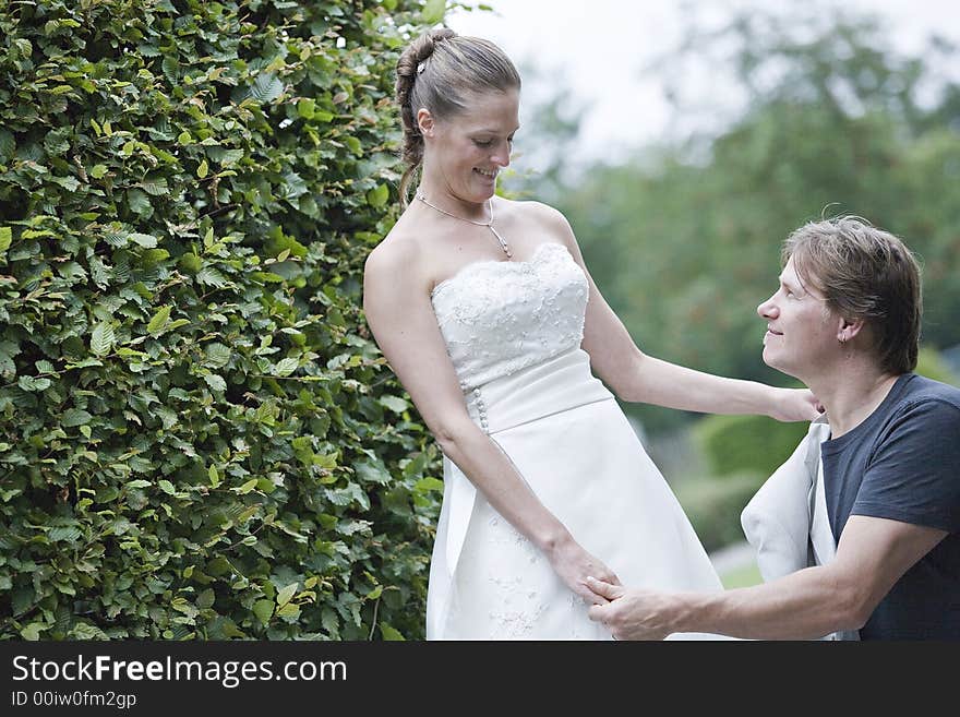 pictures shooten on a wedding day from newly weds at a park. pictures shooten on a wedding day from newly weds at a park