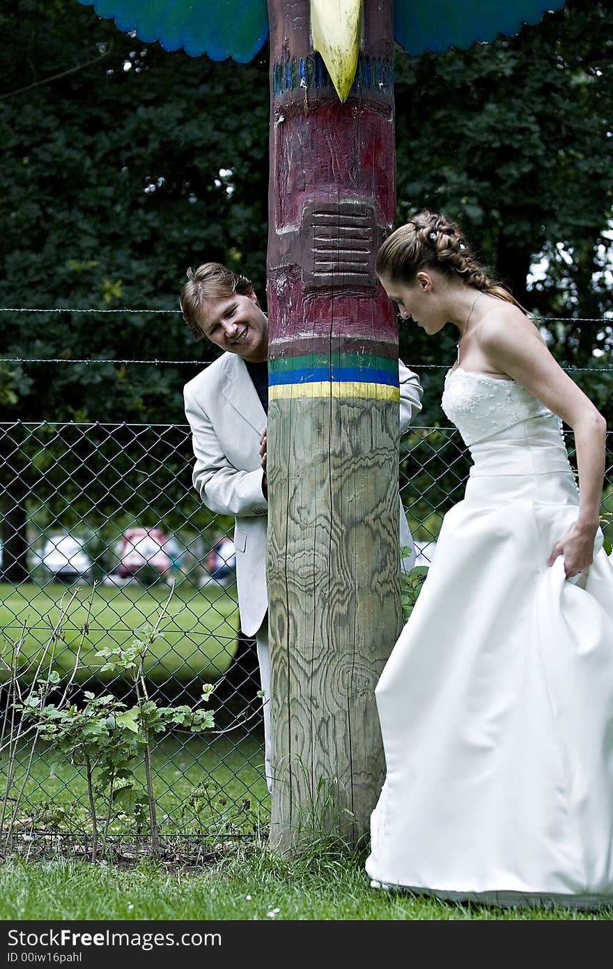 pictures shooten on a wedding day from newly weds at a park. pictures shooten on a wedding day from newly weds at a park