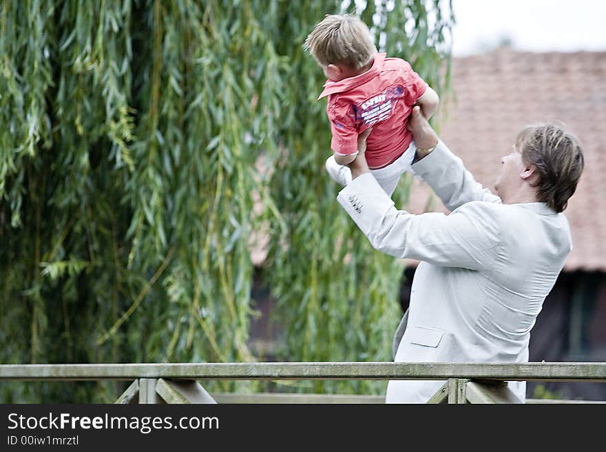 Groom and son on the bridge