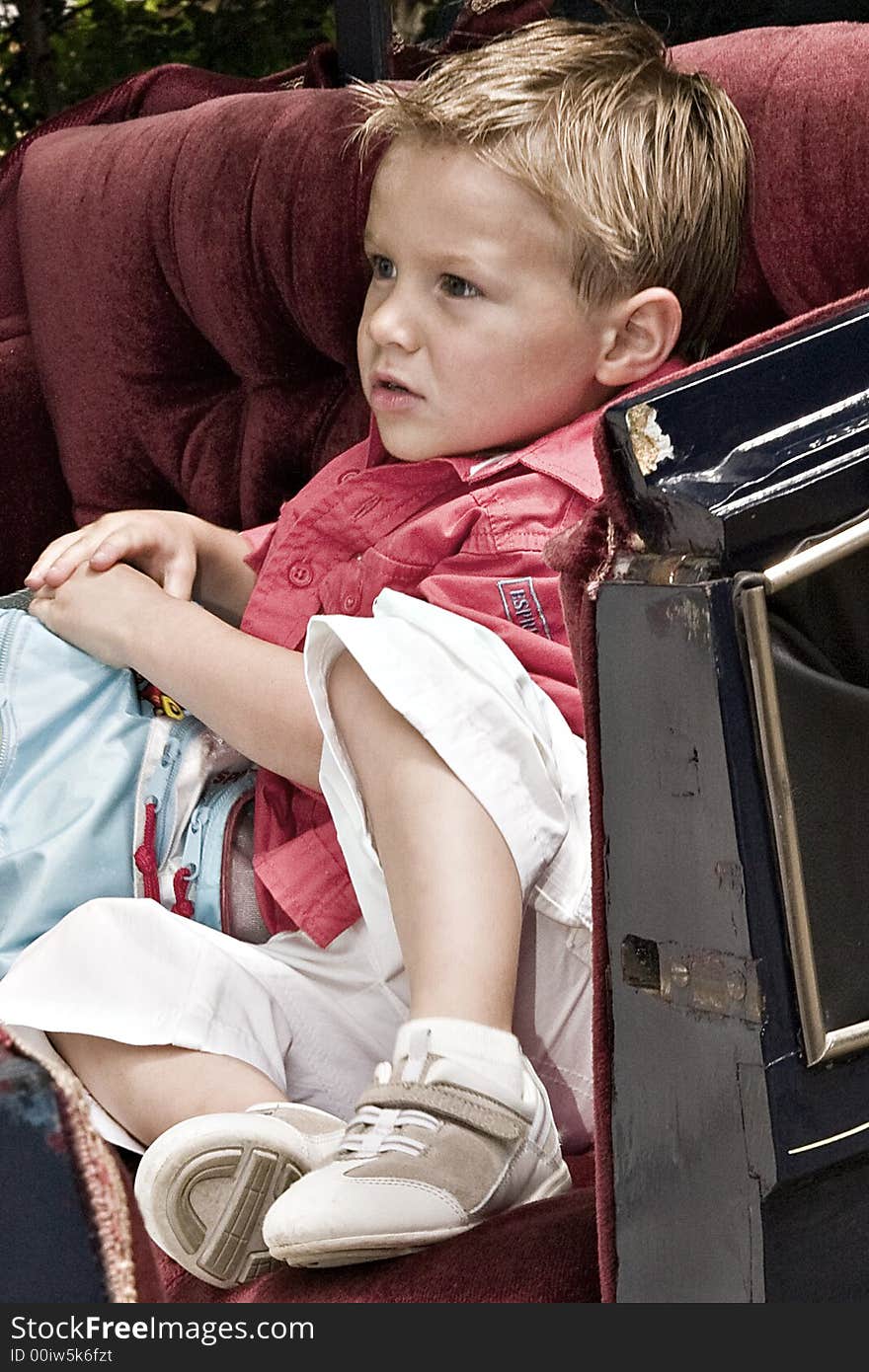 Son sitting in bridal coach. Son sitting in bridal coach