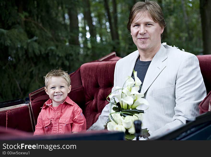 Father and son on way to weddi