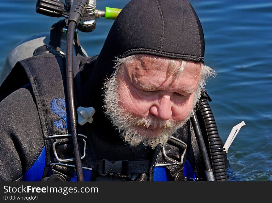 Series of images of Scuba Divers preparing to enter the water. Series of images of Scuba Divers preparing to enter the water.