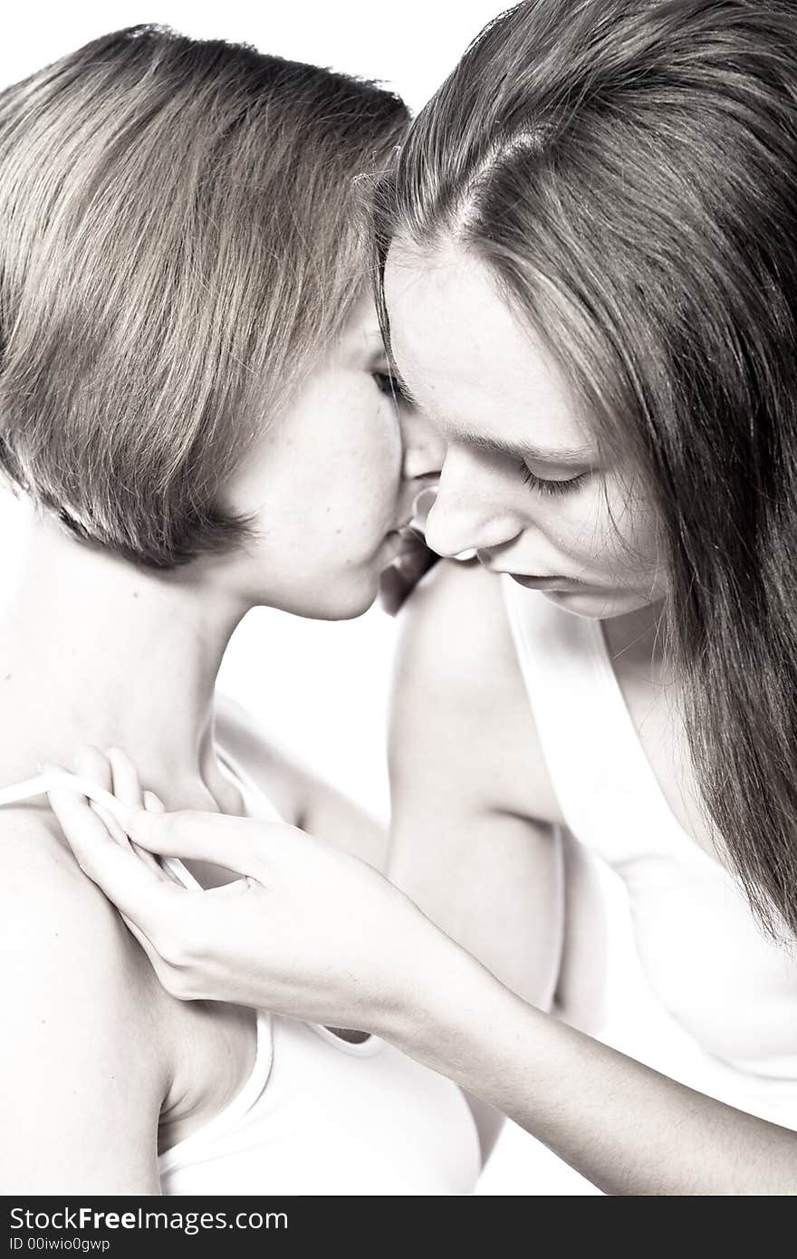 Two beauty girlfriends in lingerie in the photo studio. Two beauty girlfriends in lingerie in the photo studio