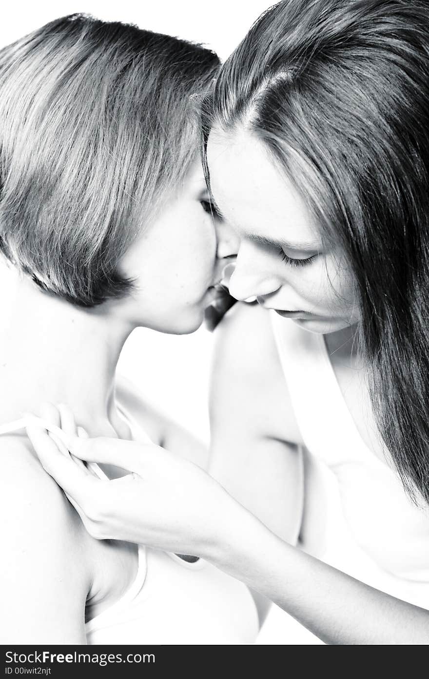 Two beauty girlfriends in lingerie in the photo studio. Two beauty girlfriends in lingerie in the photo studio