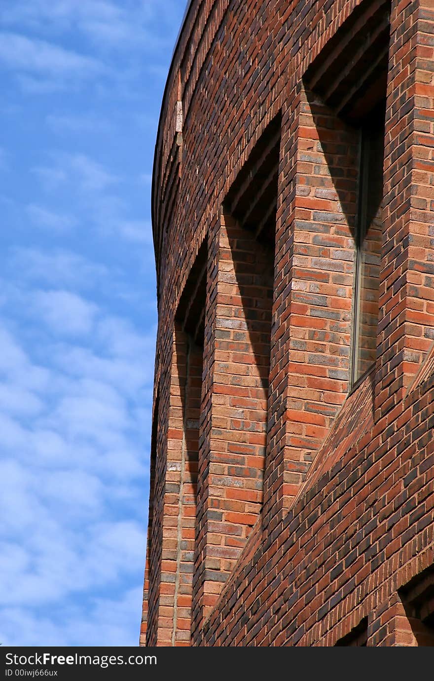 Curved brick building