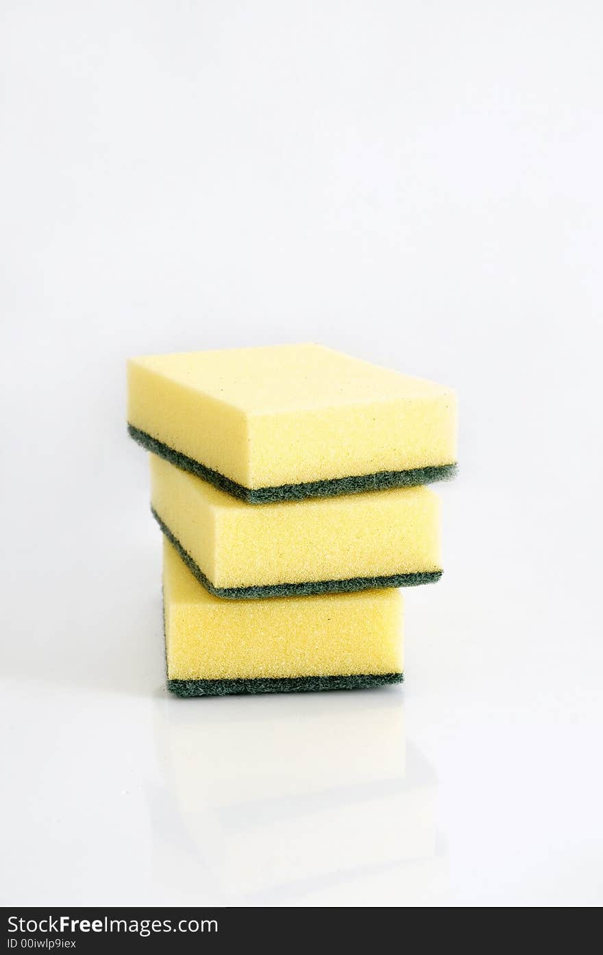 Stack of household cleaning sponges isolated. Stack of household cleaning sponges isolated