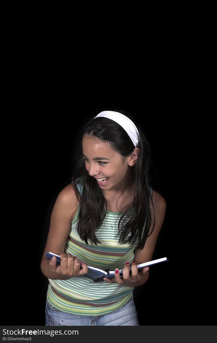 Girl posing for back to school theme over black background