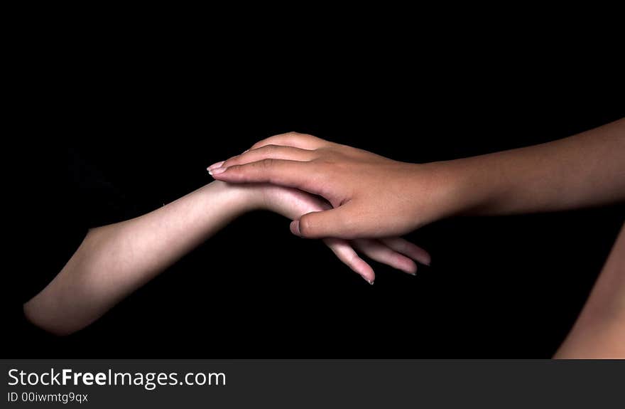 Kids doing hand signs over black background