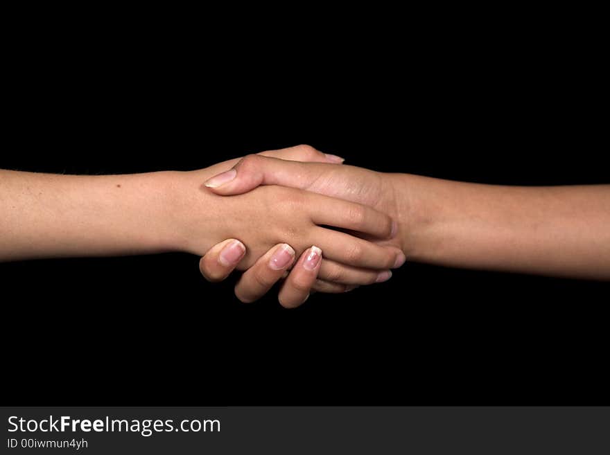 Kids doing hand signs over black background