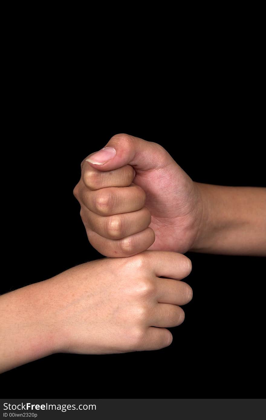 Kids doing hand signs over black background