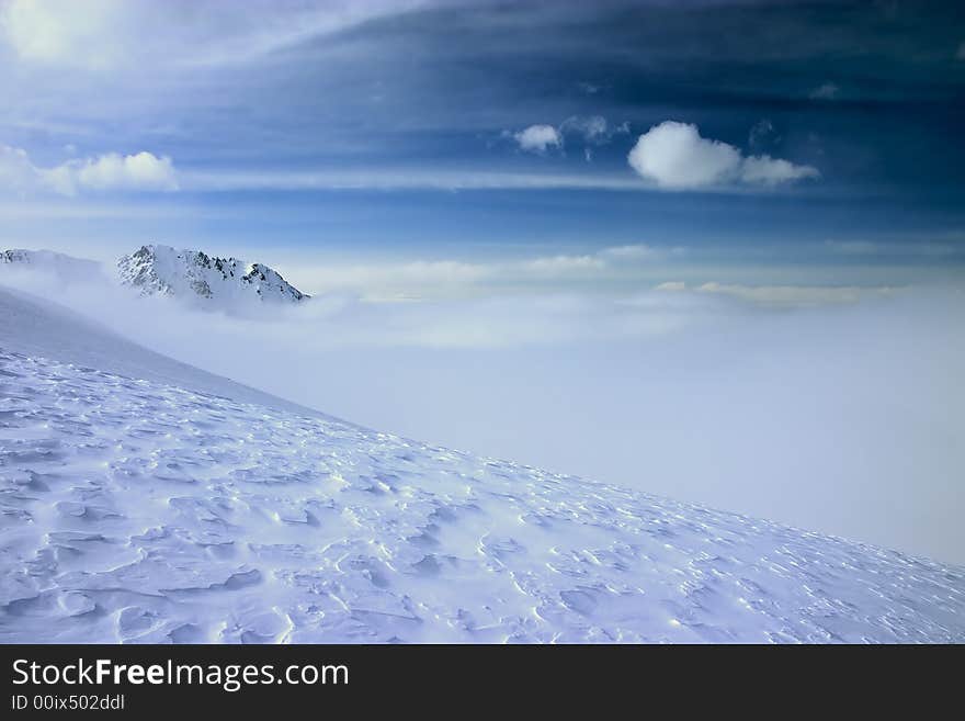 View over clouds and sky. Tien Shan, Kazakhstan. View over clouds and sky. Tien Shan, Kazakhstan