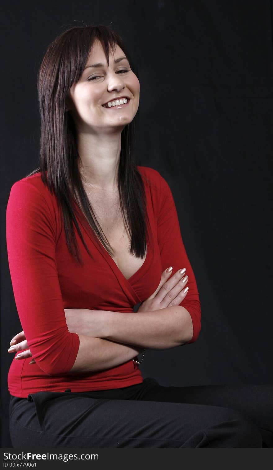 Pretty girl in red top, black background