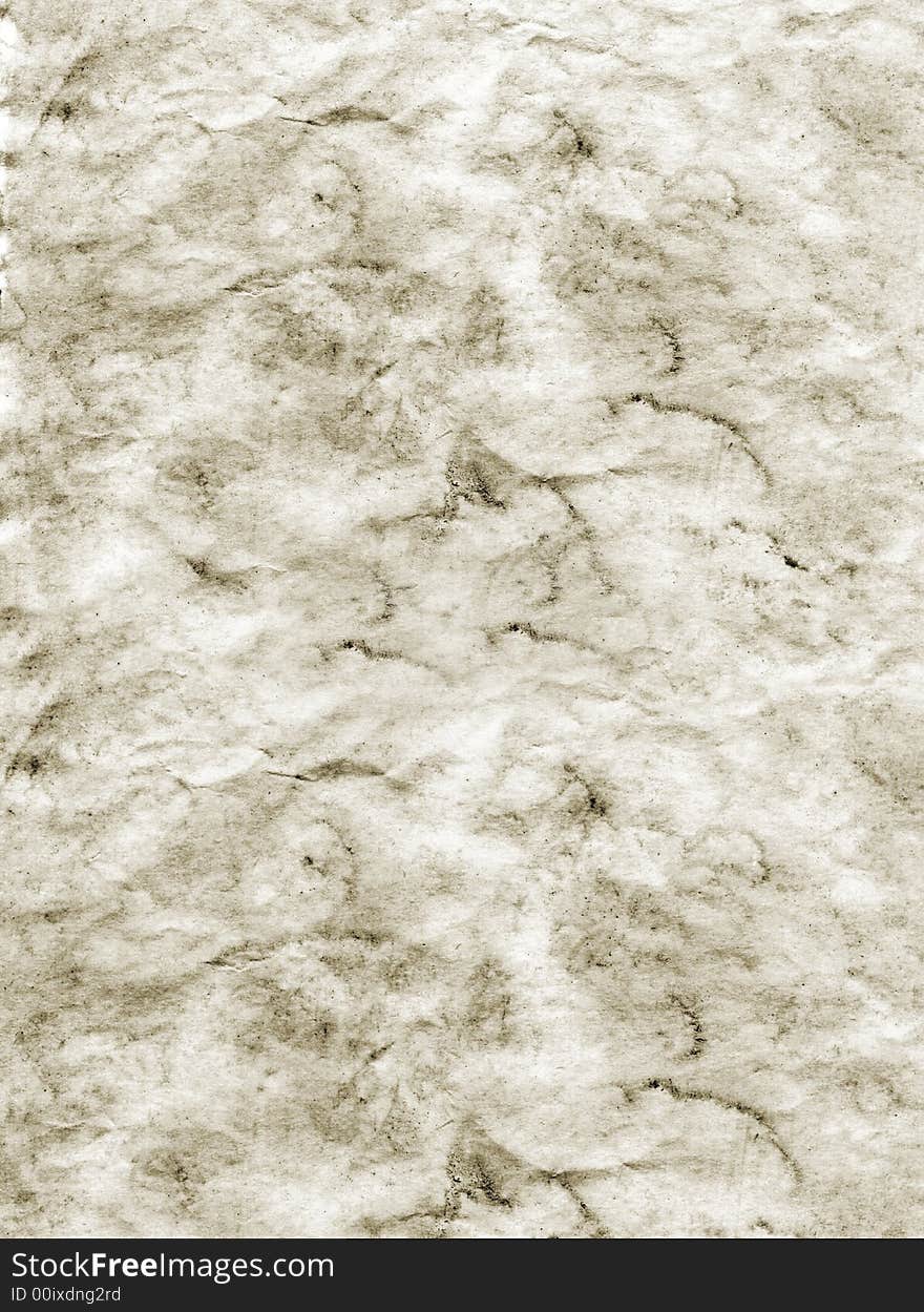 Grey grunge background of paper which is blotchy