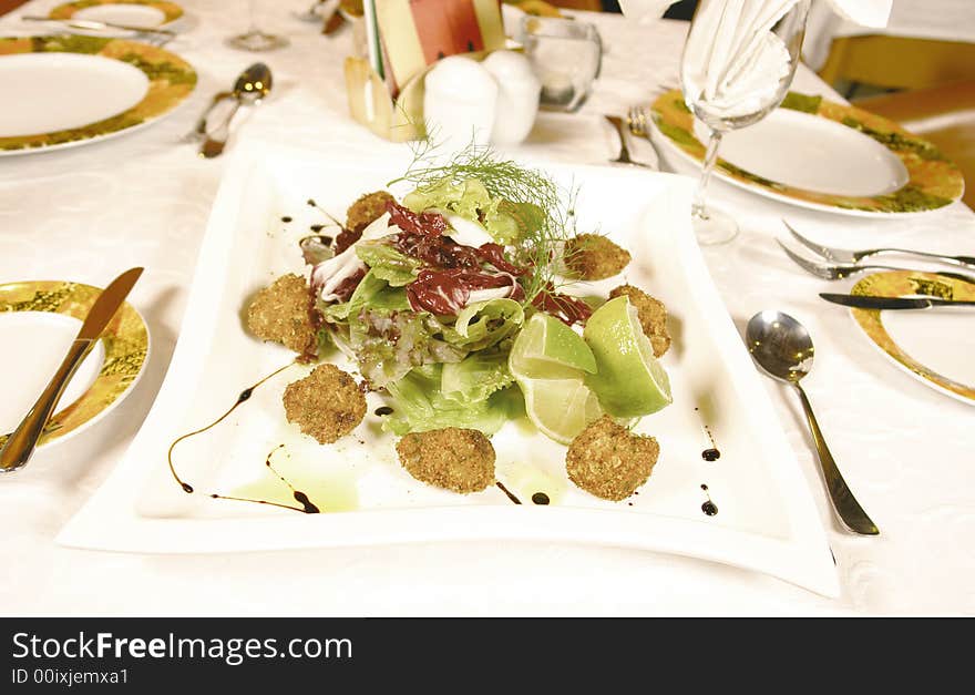 Green salad with beef meatballs and balsamic dressing. Green salad with beef meatballs and balsamic dressing