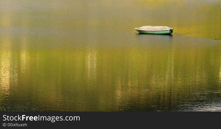 Lonely boat on peaceful water