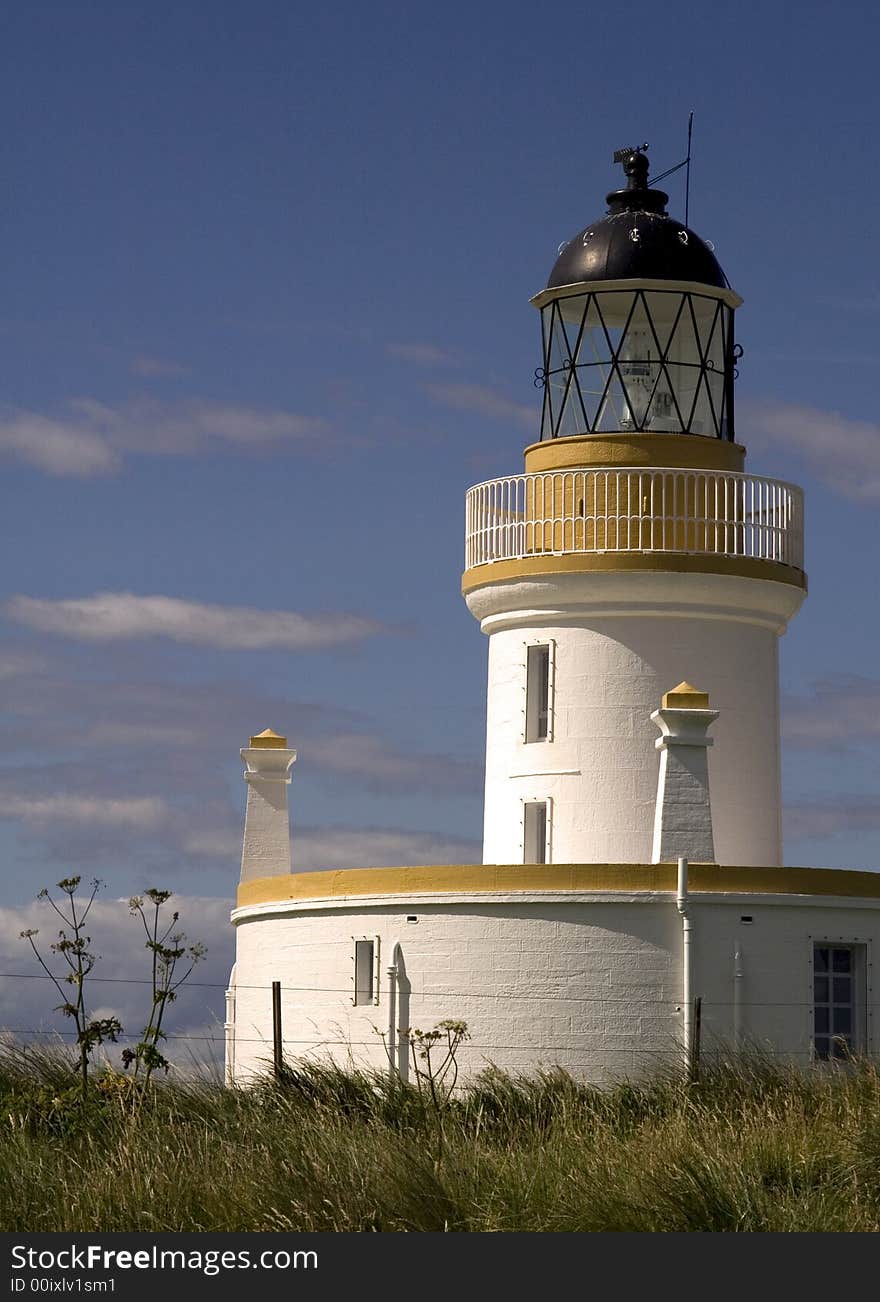 Yellow and white lighthouse on the east coast of Scotland