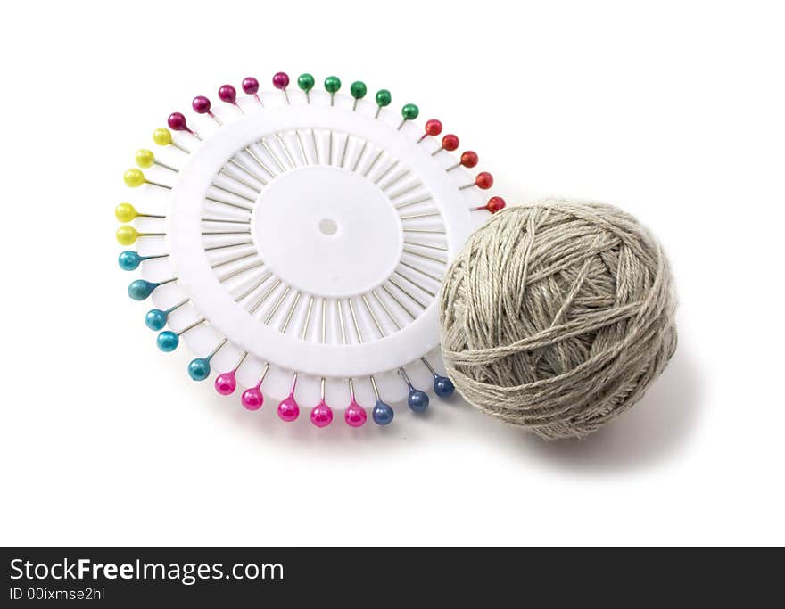 Pins and ball of thread