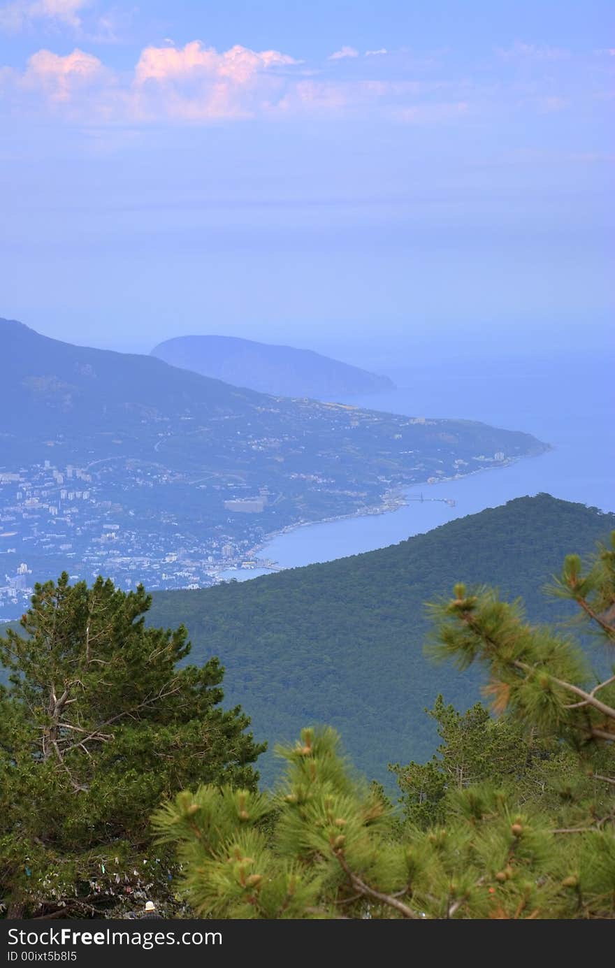 City on mountain at ocean. A sea bay with picturesque mountains - Bear mountains