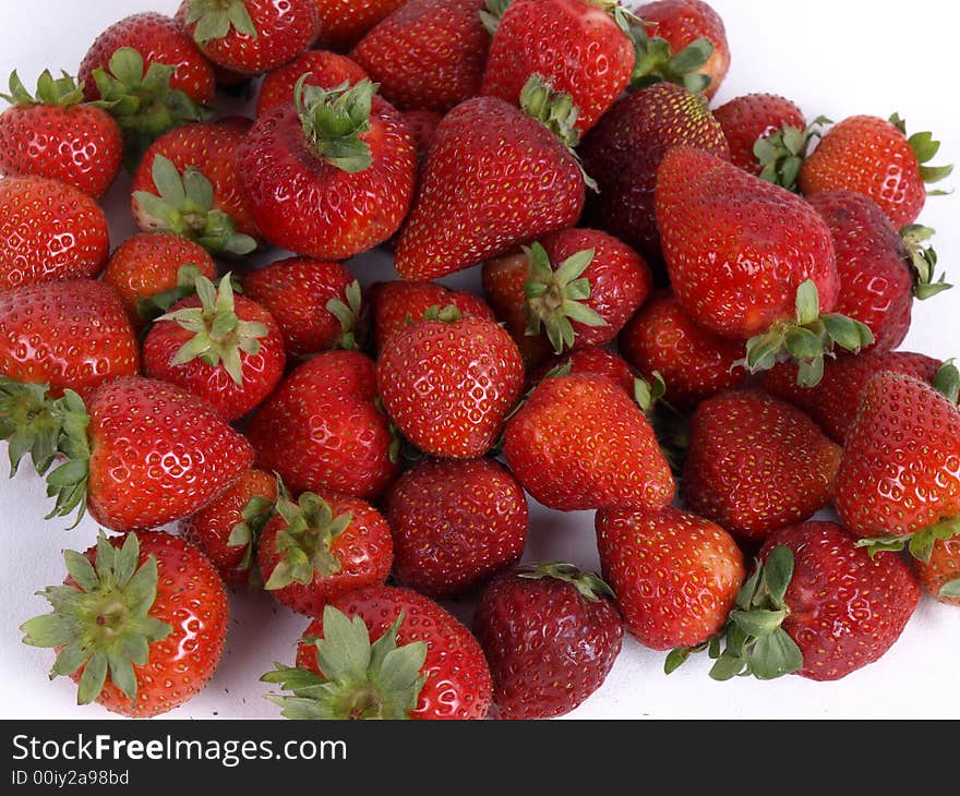 A pile of fresh strawberries