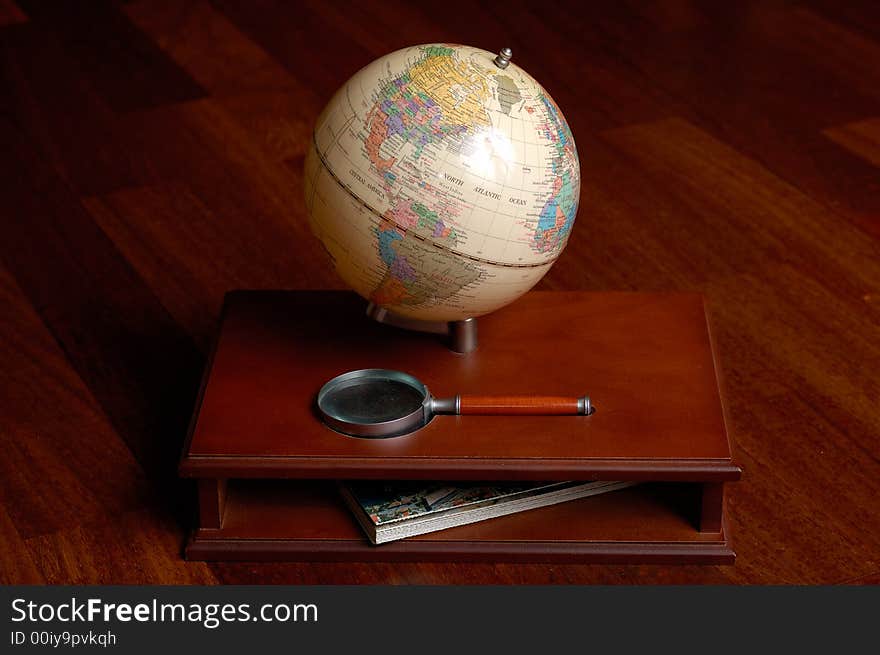 A small table globe standing on a prop have a beautiful luxury lightning