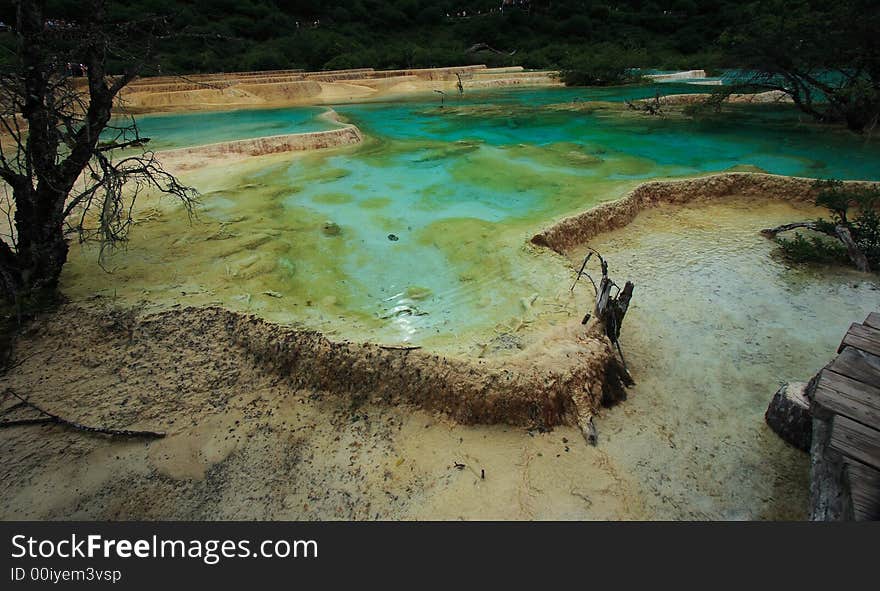 Situated in the north-west of Sichaun Province, the Huanglong valley is made up of snow-capped peaks and the easternmost of all the Chinese glaciers. In addition to its mountain landscape, diverse forest ecosystems can be found, as well as spectacular limestone formations, waterfalls and hot springs. The area also has a population of endangered animals, including the giant panda and the Sichuan golden snub-nosed monkey.   Huanglong was desinated as World Heritage Site by UNESCO in 1992. Situated in the north-west of Sichaun Province, the Huanglong valley is made up of snow-capped peaks and the easternmost of all the Chinese glaciers. In addition to its mountain landscape, diverse forest ecosystems can be found, as well as spectacular limestone formations, waterfalls and hot springs. The area also has a population of endangered animals, including the giant panda and the Sichuan golden snub-nosed monkey.   Huanglong was desinated as World Heritage Site by UNESCO in 1992