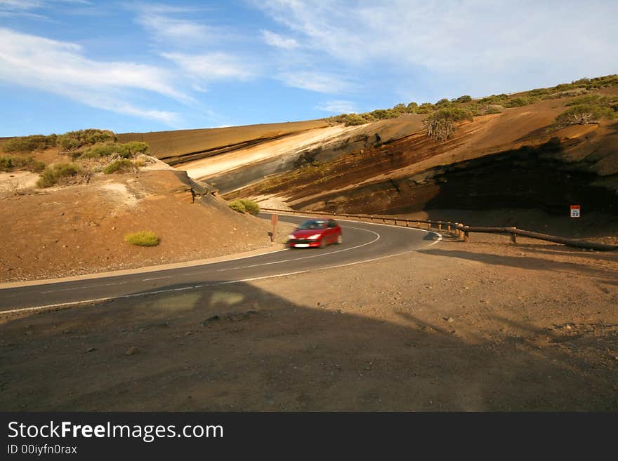 Red car in a curve. Red car in a curve