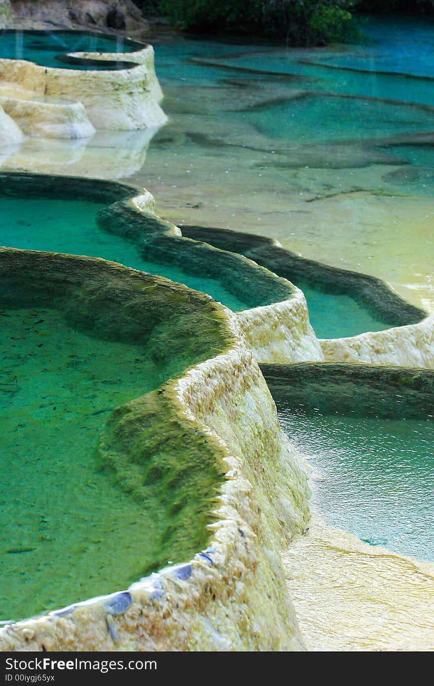 Limestone deposits and hot springs in the Huanglong Scenic Area, China.