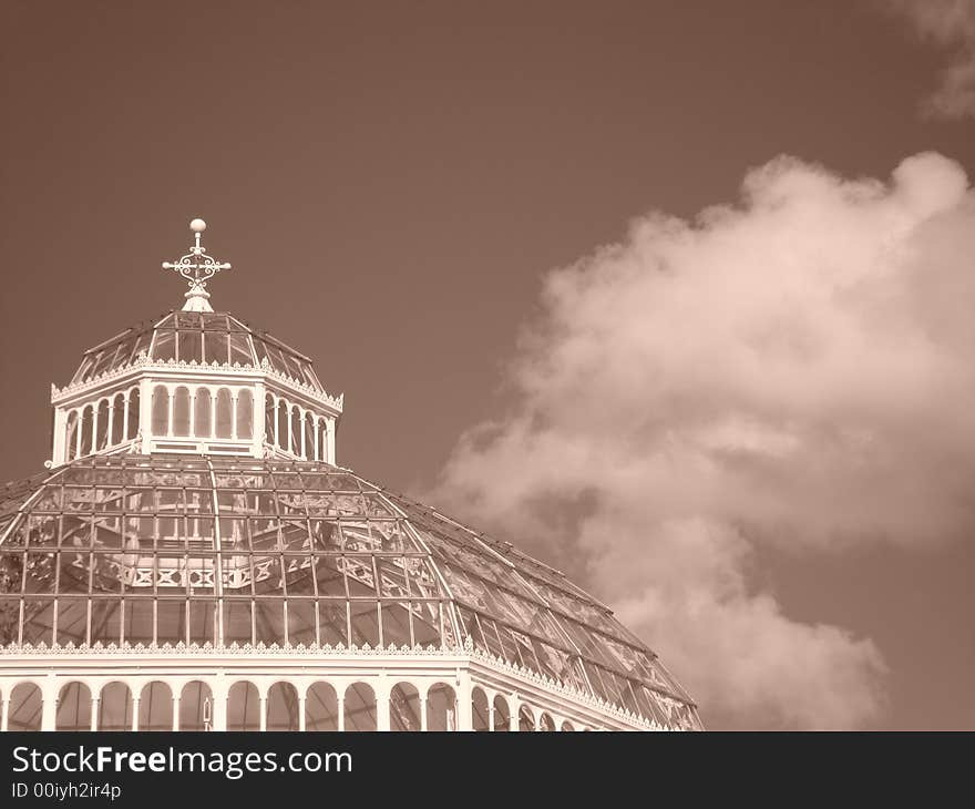 Top of the victorian Palm House in Sefton Park, Liverpool with sunlight reflected off the metalwork. Top of the victorian Palm House in Sefton Park, Liverpool with sunlight reflected off the metalwork.