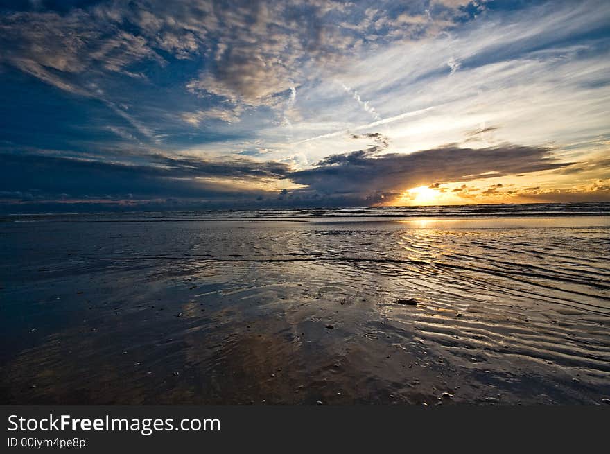 Beautiful sunset and waves on the beach. Beautiful sunset and waves on the beach