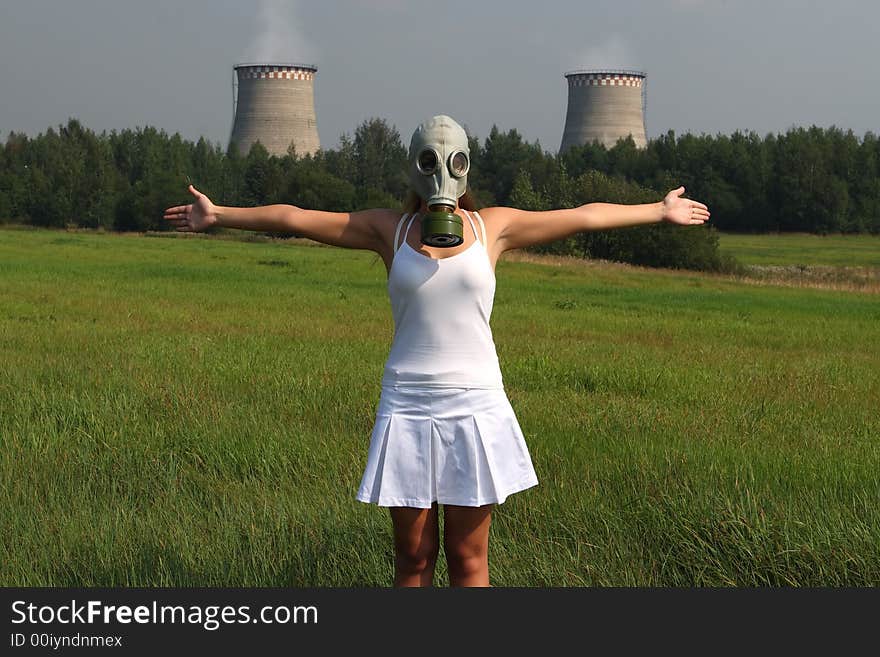 Girl in a gas mask and smoke pipes