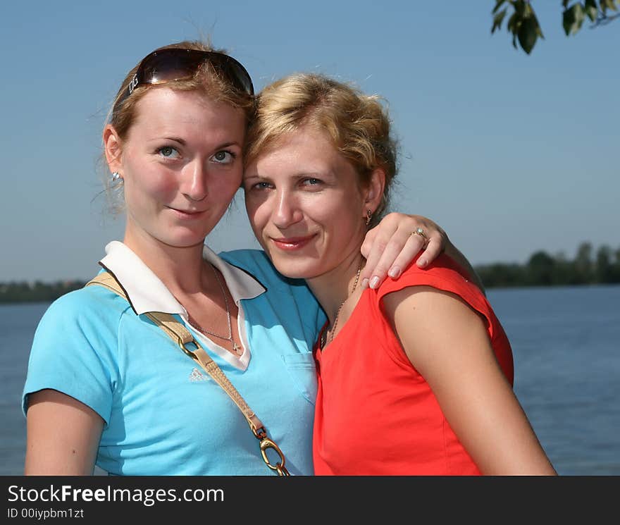 Two  women stand together