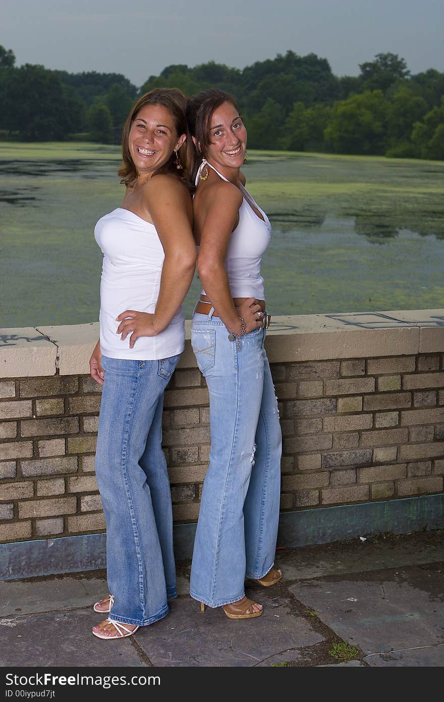 Two sisters posing for a portrait