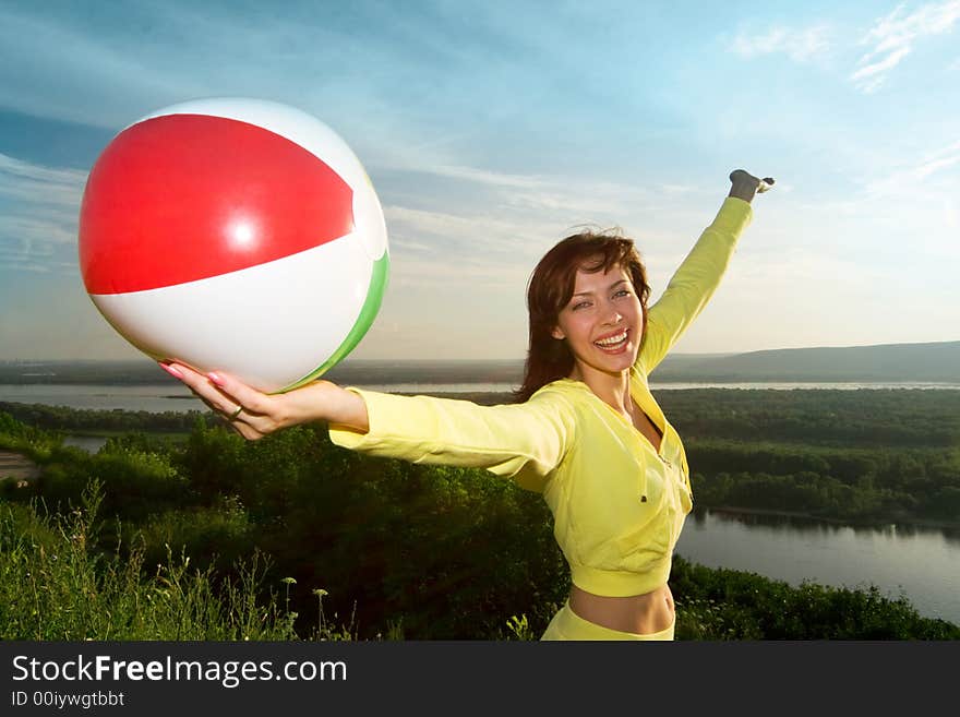 Happy young beautiful girl with air ball. Happy young beautiful girl with air ball