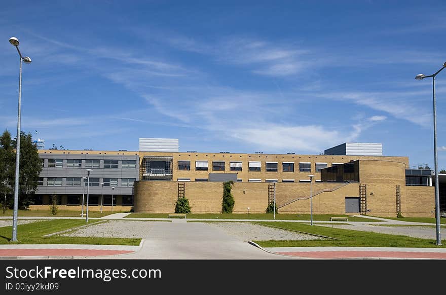 Modern university building on the blue sky background. Modern university building on the blue sky background