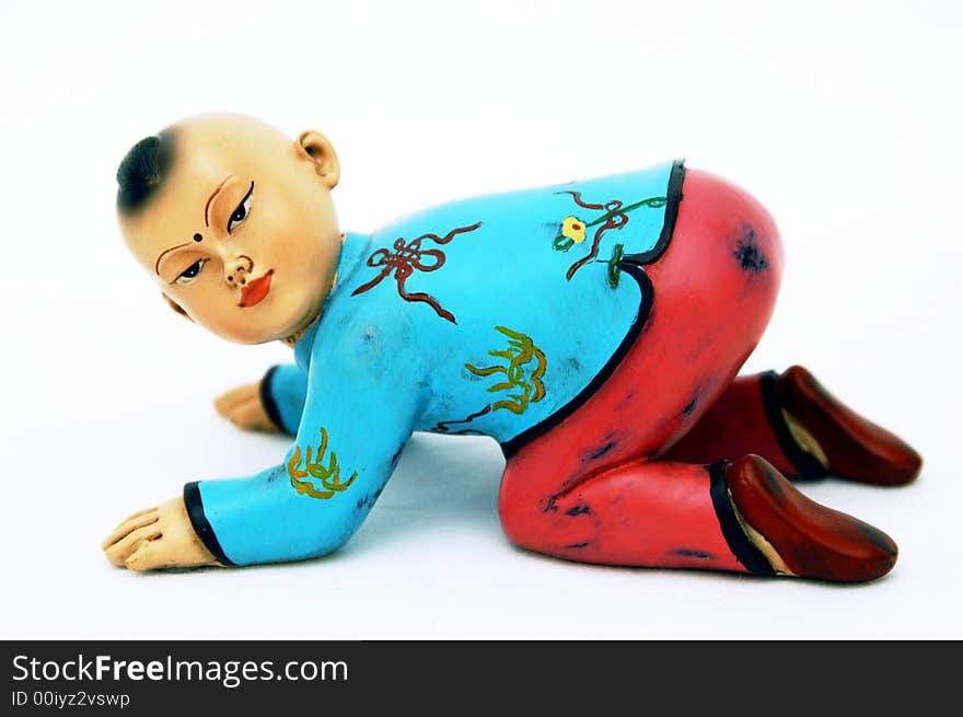 Small chinese figurine in white background. Small chinese figurine in white background