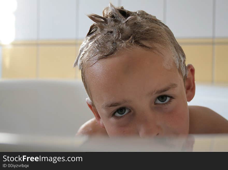 Photo of young happy boy in bath. Photo of young happy boy in bath