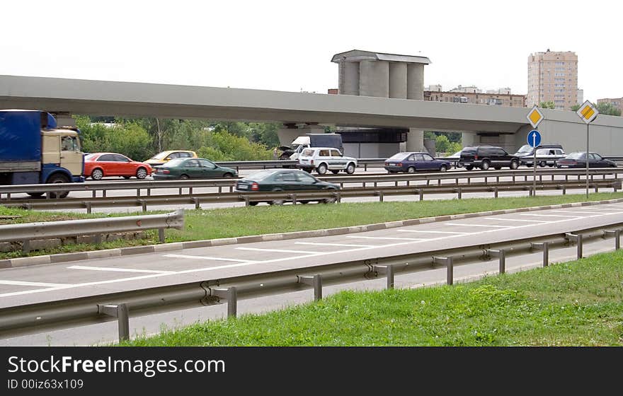 Cars move on highway at high speed