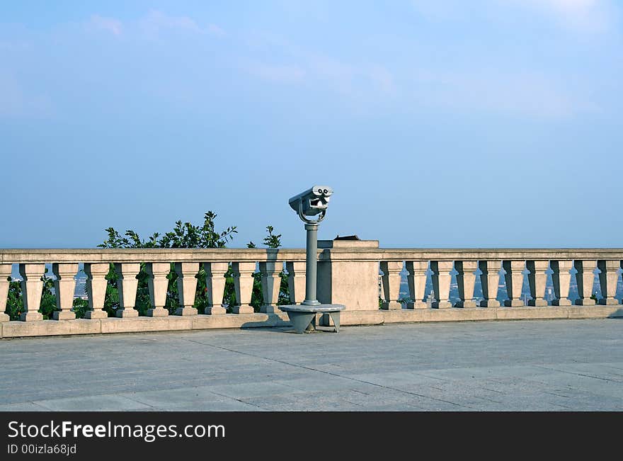 Sightseeing. Telescopic viewfinder on a touristic site.