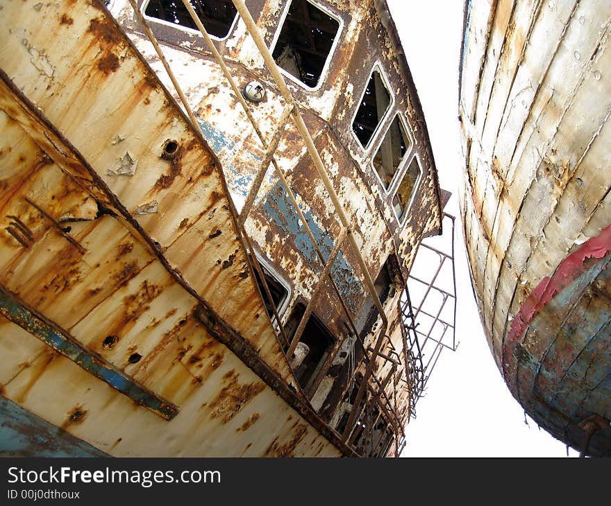 Two old rusty fishing boats. Two old rusty fishing boats