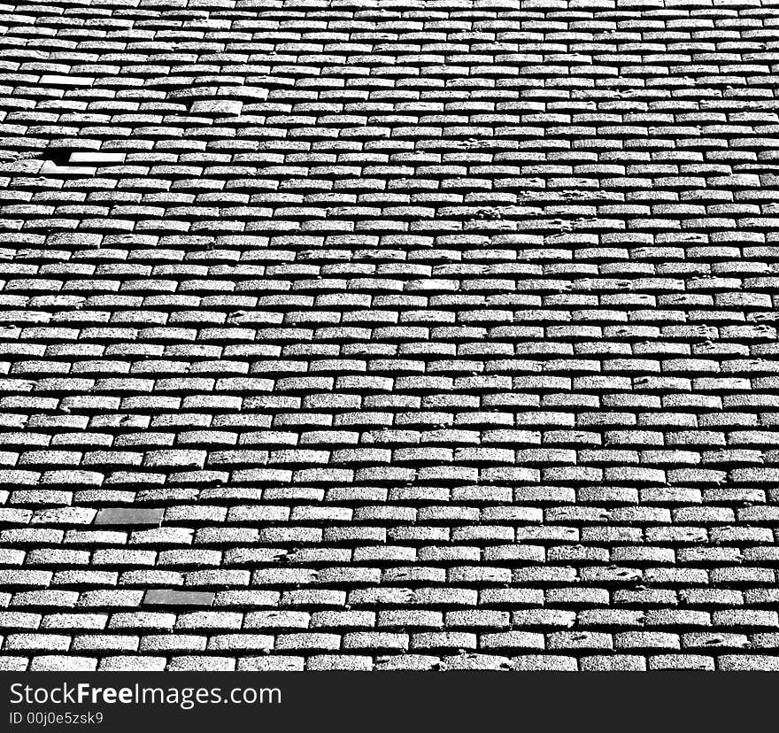 A photo of a roof top tile pattern background. A photo of a roof top tile pattern background.