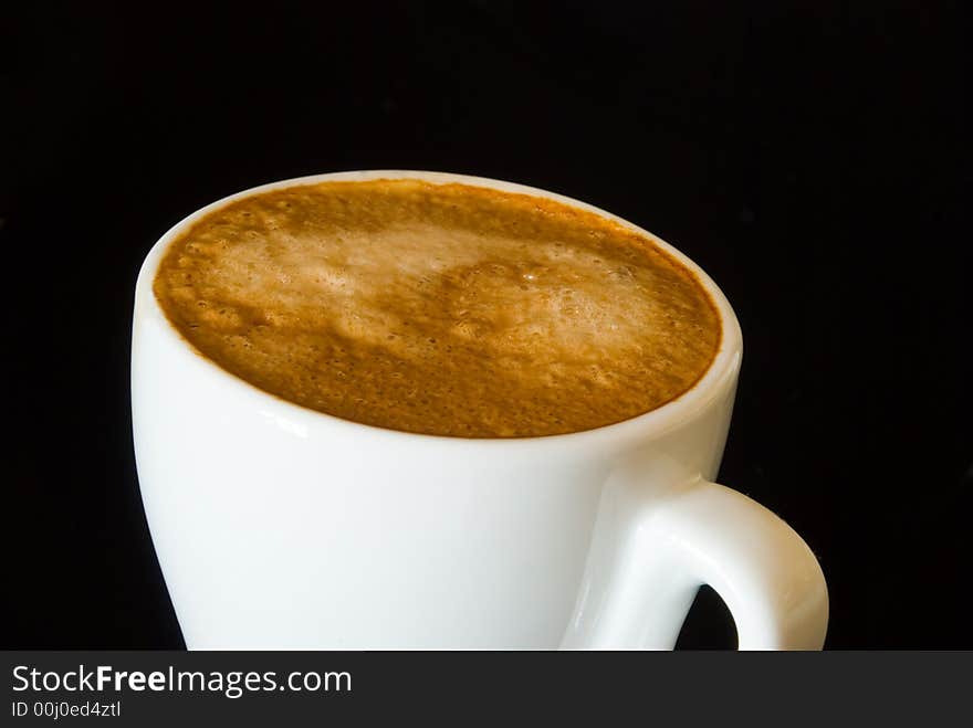 Cup espresso on the black background.