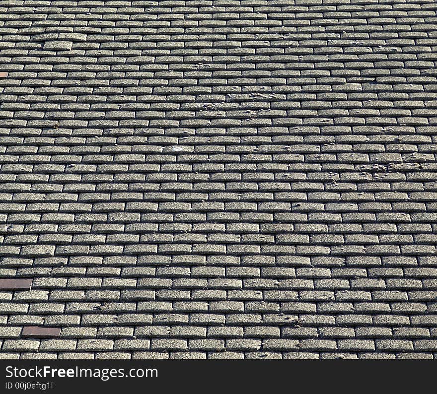 A photo of a roof top tile pattern background. A photo of a roof top tile pattern background.