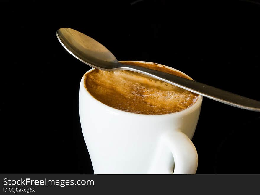 Cup espresso on the black background.