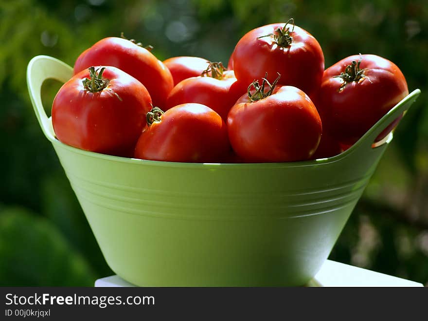 Close up on tomatoes in basket