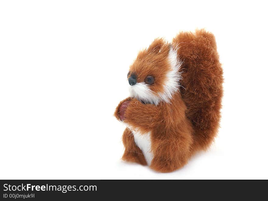 Cute plushy squirrel in front of a white background. Cute plushy squirrel in front of a white background.