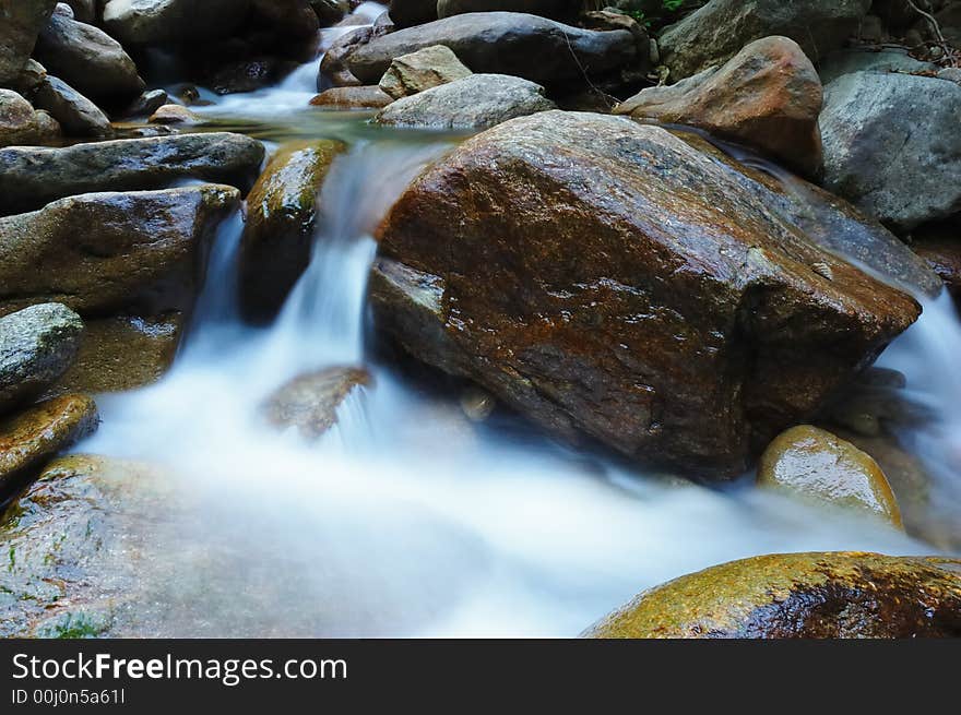 Little brook waterfall, summer season