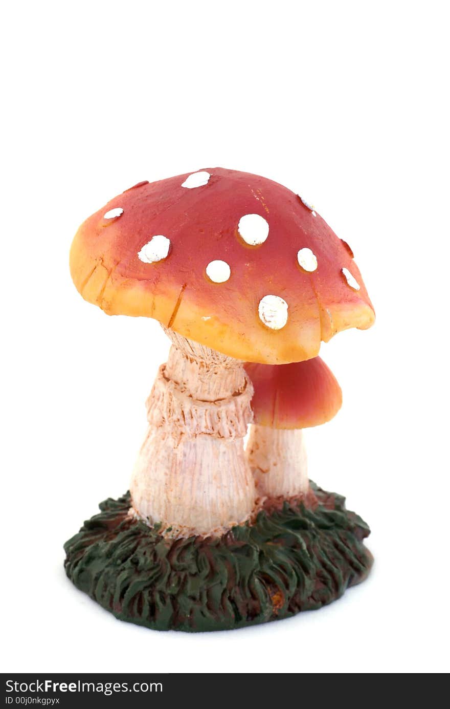 Toadstool with dots in front of a white background. Toadstool with dots in front of a white background.