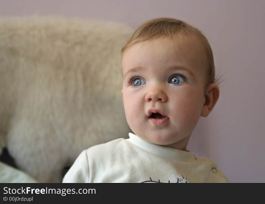 A portrait of a blue eyed baby.